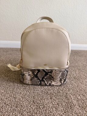 Cream Backpack with Snake-Print Base and Gold Hardware
